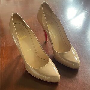 Christian Louboutin Beige Patent Heels with Iconic Red Soles